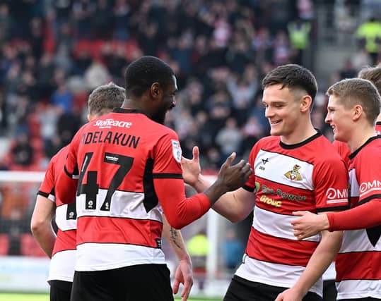 Hakeeb Adelakun celebrates his strike with Owen Bailey