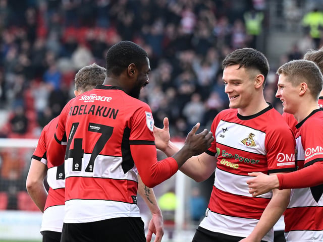 Hakeeb Adelakun celebrates his strike with Owen Bailey