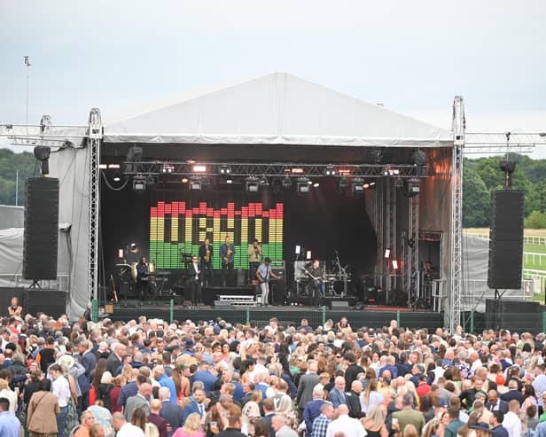 UB40 performing at Doncaster Racecourse.