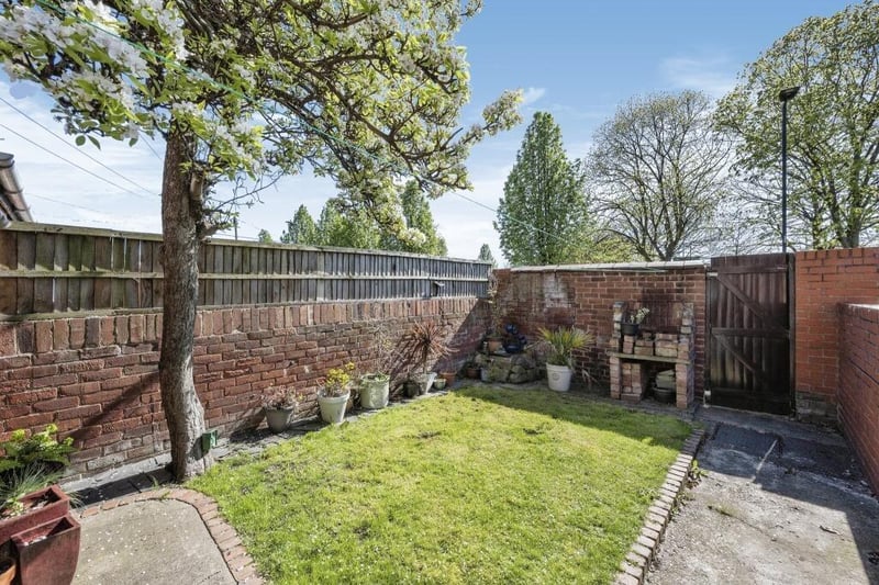A lawned and enclosed garden forms part of this property.