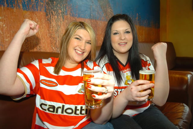 Fans watching Doncaster Rovers play in the final of the Johnstone's Paint Trophy in the Walkabout pub in Doncaster. l/r Amanda Hall and Alannah Pilkington.