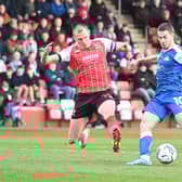 Tommy Rowe in action against Cheltenham. Picture: Howard Roe/AHPIX LTD