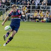 Sam Olver kicks for goal against Bedford earlier this season. Picture: Tony Johnson.