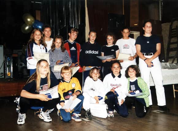 Doncaster Belles under 12's at a presentation night in 1998. Manager Vicky Exley is far right standing, while the long-serving player and former England international Gail Borman is second left standing,
