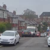 Two suspects in dark clothing were seen to fire shots on St James' Garden in Balby, Doncaster, before fleeing the scene on an electric bike.
