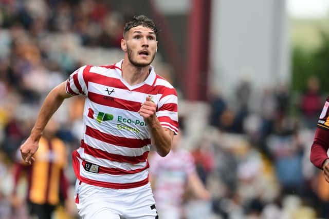 Josh Andrews in action for Doncaster Rovers.