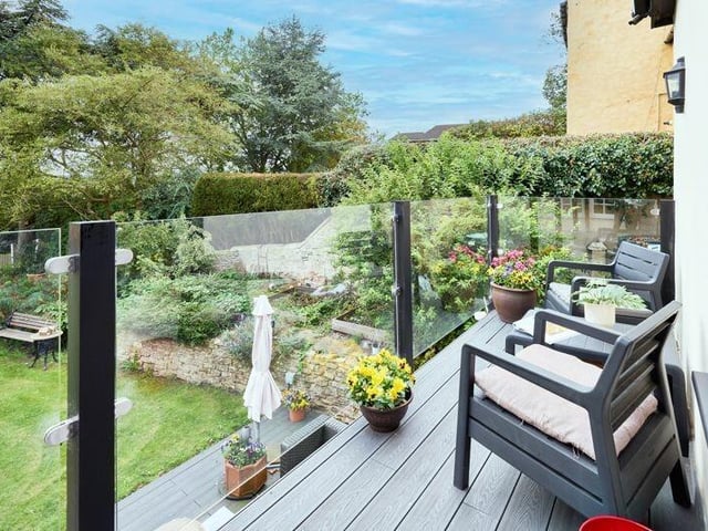 A balcony from the family room looks out over miles of countryside.