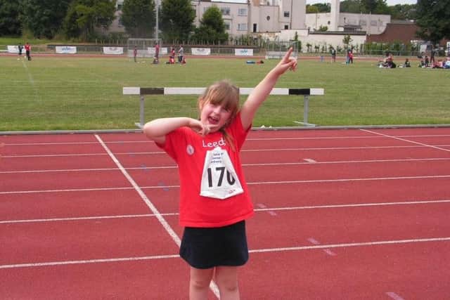 Young Ellie Greenwood competing