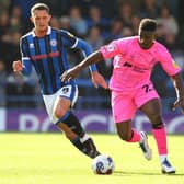 Kieran Agard takes on Rochdale's James Ball. Picture: David Munro/AHPIX LTD