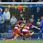 Ali Al Hamadi opens the scoring for AFC Wimbledon against Doncaster Rovers.