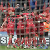 Rovers celebrate after Rodrigo Vilca's goal puts them 3-0 up against Cheltenham. Picture: Howard Roe/AHPIX