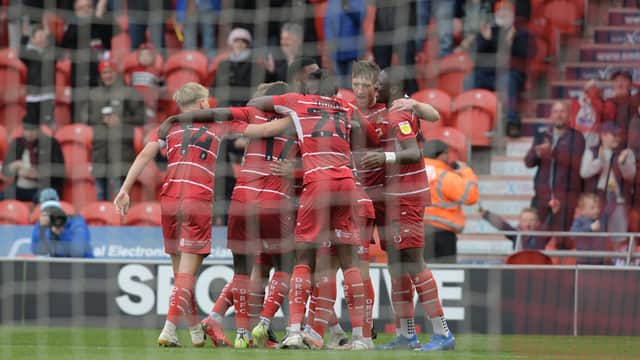 Rovers celebrate after Rodrigo Vilca's goal puts them 3-0 up against Cheltenham. Picture: Howard Roe/AHPIX