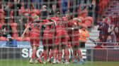 Rovers celebrate after Rodrigo Vilca's goal puts them 3-0 up against Cheltenham. Picture: Howard Roe/AHPIX