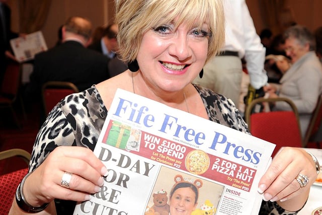 2010 saw the Press made the switch from broadsheet to tabloid format - and it was a huge success. Pictured at the launch party is Jill Kennedy with a copy of the first ever tabloid edition.