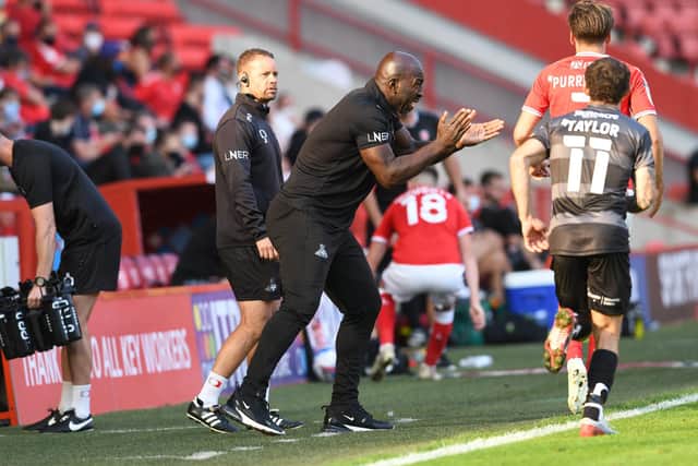 Darren Moore urges his players on at Charlton. Picture: Howard Roe/AHPIX