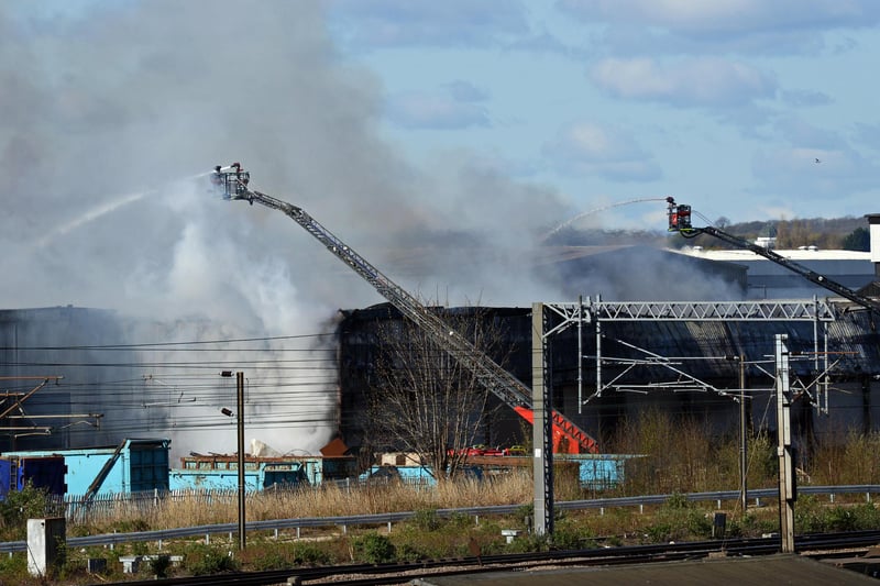 The fire has raged at Morris Metals for more than 15 hours.