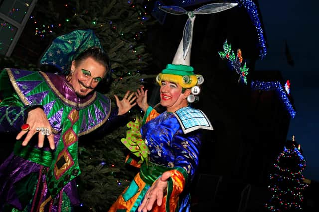 Aladdin cast members Ian Crowe, Abanazar and Mark Stratton, Widow Twanky, pictured at the light switch on.