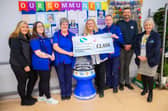 Members of the Tesco Superstore Fundraising Team (from left to right) Bethany Ward; Sophie Ward; Andrea Byatt; Amanda Woods and Mat Richards, are pictured with Store Manager Gareth Coutts and St John’s Hospice Fundraiser Maureen Harworth.