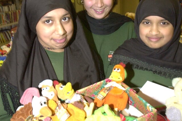 Ussema Hussain, Tamina Majid, both 13, and Samera Ghafoor, 12, from Fir Vale School with some of the Christmas presents for Eastern Europe.