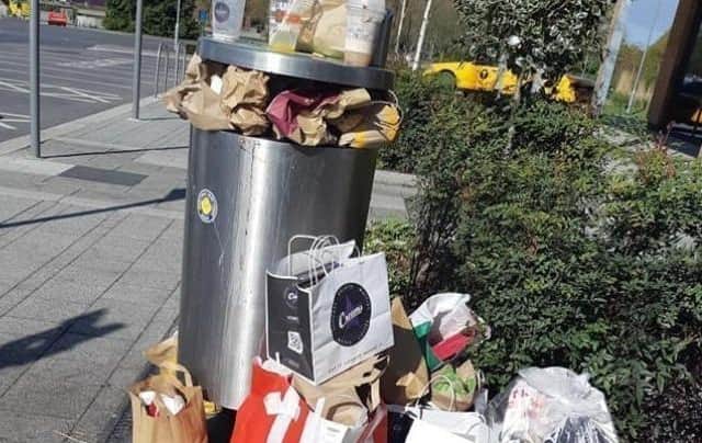 An overflowing waste bin at the Herten Triangle, which has been blighted by litter since opening