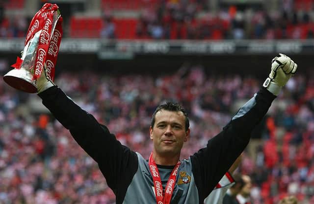 Neil Sullivan celebrates victory in the 2008 League One Play-Off Final. Photo: Clive Rose/Getty Images