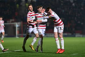 Doncaster's James Maxwell celebrates his goal.