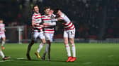 Doncaster's James Maxwell celebrates his goal.