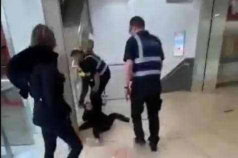 Footage shows the teenage girl being knocked to the floor and then dragged through broken glass by a security guard inside the Frenchgate centre.