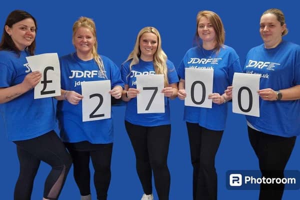 The five strong team raised £2,700 to help diabetes patients after completing a gruelling triathlon challenge.