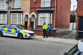 An alleyway between Whitburn Road and Apley Road has been sealed off by police with a murder probe launched.