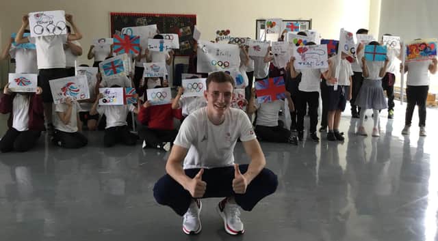 Bradly Sinden, pictured with Atlas Academy pupils.
