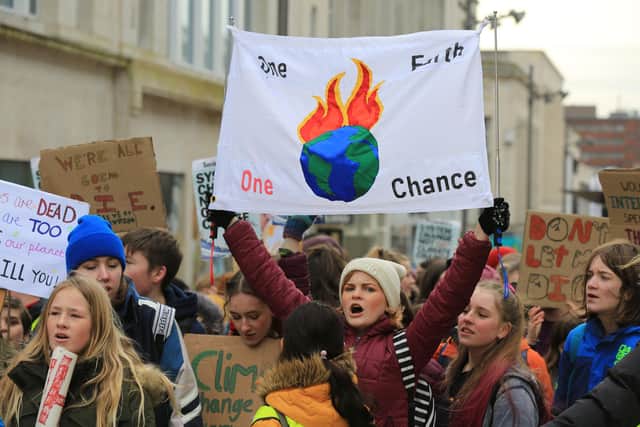 Climate change protesters young and oldtook to the streets of Sheffield on Valentine's Day, Friday, February 14, demanding urgent action to save our planet.