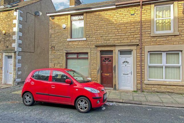 This three-bedroom, end-terrace home is on the market for £95,000 with JD Gallagher.