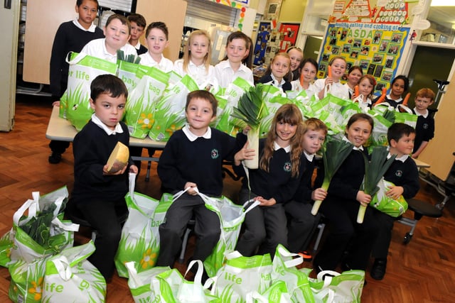 West Boldon Primary School junior pupils with their harvest produce packed and ready for distribution to the elderly 8 years ago.