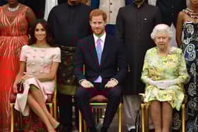 Meghan Markle pictured with husband Prince Harry and the Queen