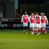 Madger Gomes cuts a dejected figure as Fleetwood celebrate going ahead against Rovers. Picture; Steve Flynn/AHPIX