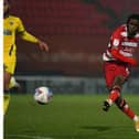 Taylor Richards fires in the second goal against AFC  Wimbledon. Picture: Howard Roe/AHPIX