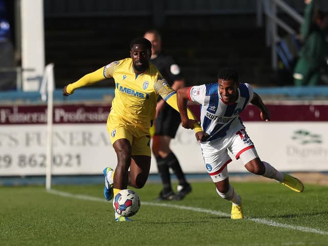 Hakeeb Adelakun, pictured (left) on loan at Gillingham last season, has joined Doncaster Rovers on loan until the end of the season (Credit: Mark Fletcher | MI News)