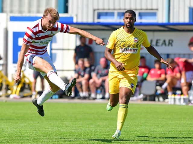 We're going for 4-4-1-1, given who's available. That would also give McSheffrey the option to call upon an in-form striker from his bench. Both Josh Andrews and George Miller have been among the goals in pre-season.