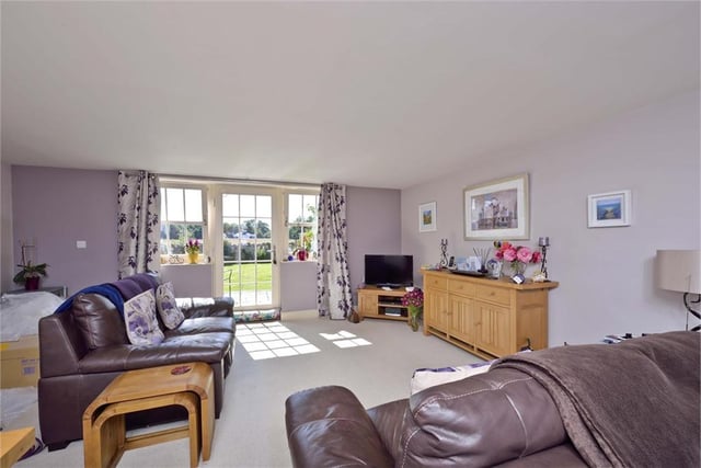 The living room in Garden Cottage benefits from great views