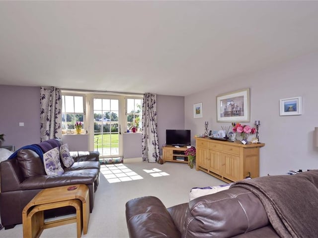 The living room in Garden Cottage benefits from great views