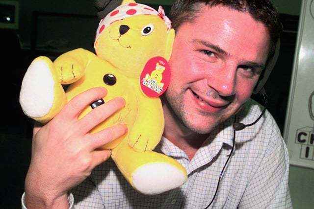 Doncaster Call Centre manager Martin Glen is pictured with the Pudsey Bear signed by Terry Wogan. The bear was auctioned off to raise money for Children In Need in 2000