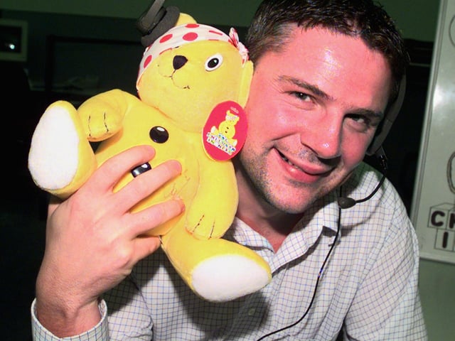 Doncaster Call Centre manager Martin Glen is pictured with the Pudsey Bear signed by Terry Wogan. The bear was auctioned off to raise money for Children In Need in 2000