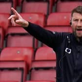Goalkeeping coach Paul Gerrard handles the instructions for defending set pieces at Rovers.
