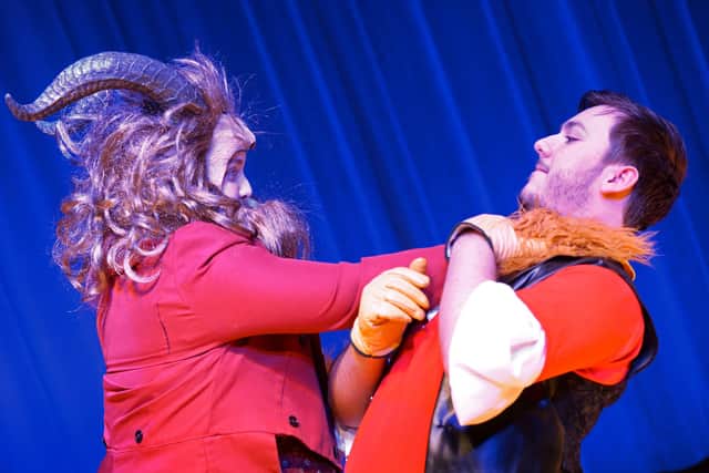 Tegan Boswell, 16, as the Beast and Brad;ey Dyas, 16, as Gaston. Picture: NDFP-03-03-20 DeWarenneAcademy 12-NMSY