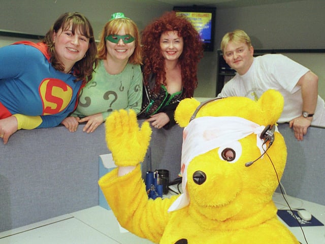 BT Doncaster Call Centre staff who were among 282 volunteer staff, most of them in fancy dress, and manned the phones to raise cash for Children in Need in 1997. Many of them worked on the line till 3.00am on Saturday. Pudsey Bear Mal Blake with staff, BT Sales supervisor Leigh Machen (Superwoman), Tracey Barnes ( Riddler), Sonja Newton (Poison Ivy) and Paul Rushby as himself.