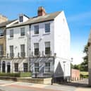 A front view of the stunning end terrace Georgian townhouse for sale.