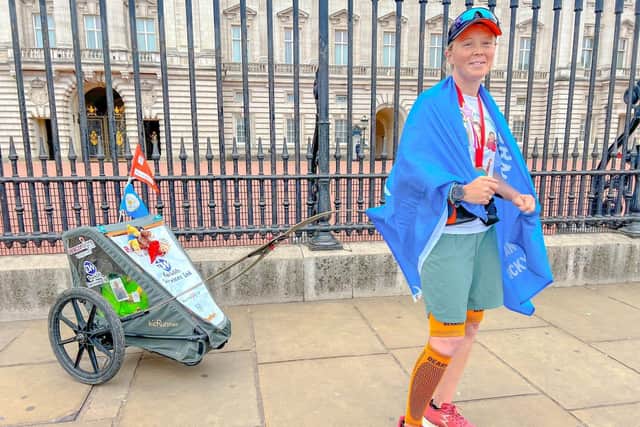Vicky Hogg ran all the way from Edinburgh to London, pulling her kit in a buggy in memory of her pal Jody.