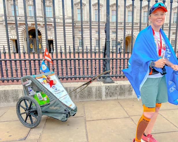 Vicky Hogg ran all the way from Edinburgh to London, pulling her kit in a buggy in memory of her pal Jody.