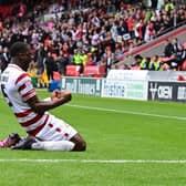 Joseph Olowu celebrates his goal.